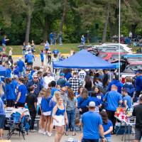 Overview picture of crowd during Family Day tailgate.